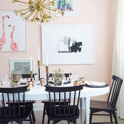 A dining room painted with Benjamin Moore's 1317 Yours Truly, paint color available at Cincinnati Color Company in Ohio.